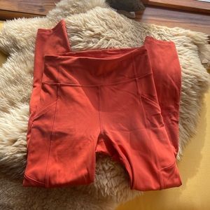 Lululemon invigorate tights in Orange size 4